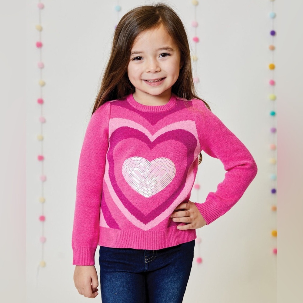 DESIGN HISTORY
SEQUIN HEART SWEATER